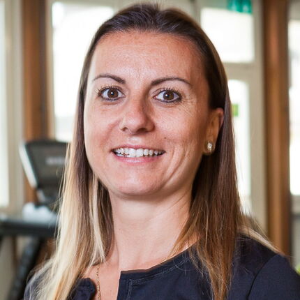 Mitarbeiterfotografie Frau mit langen Haaren